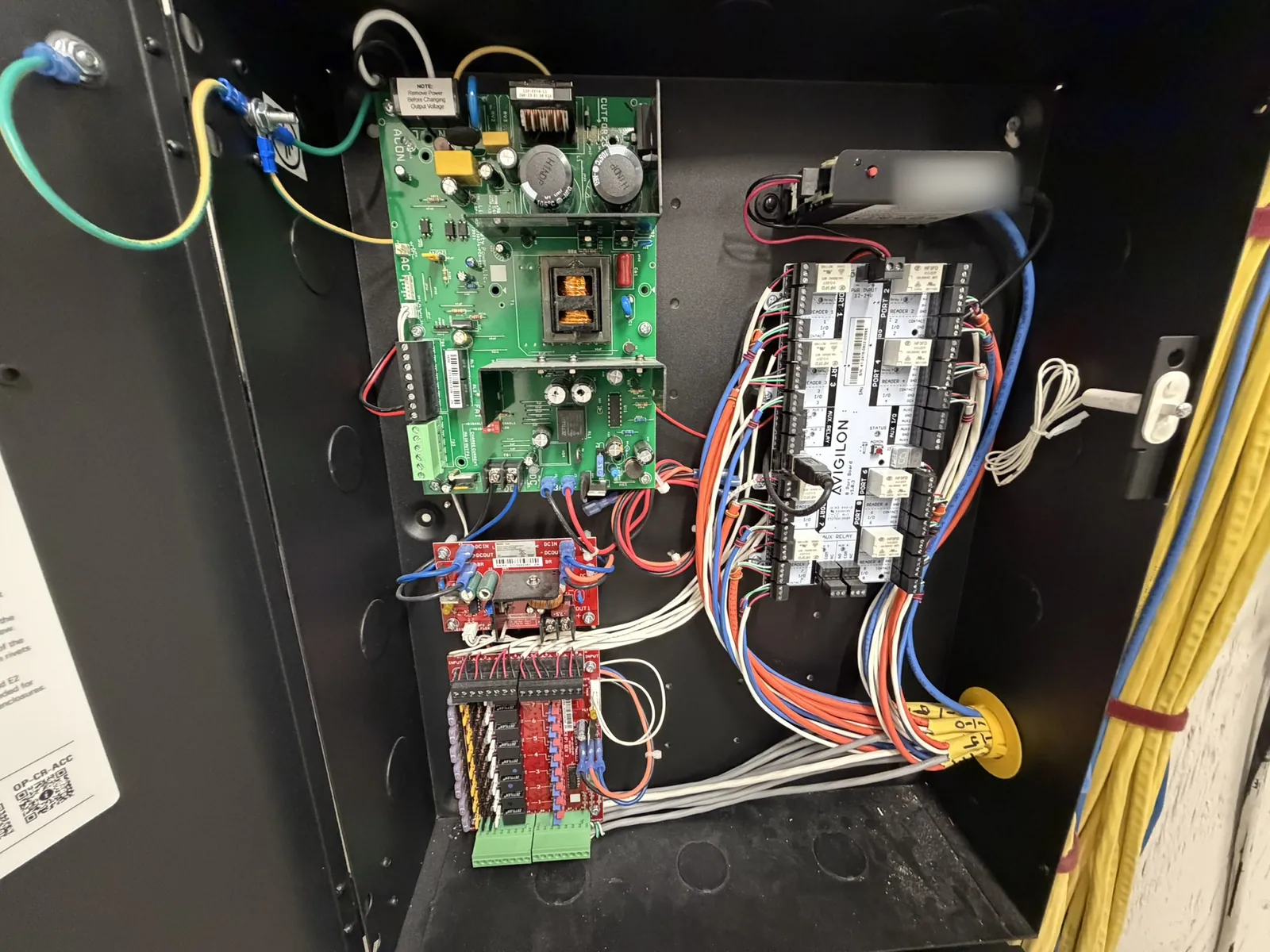Integrated security control panel with controller and power supply at a Data Pro Communications project in Orlando, FL