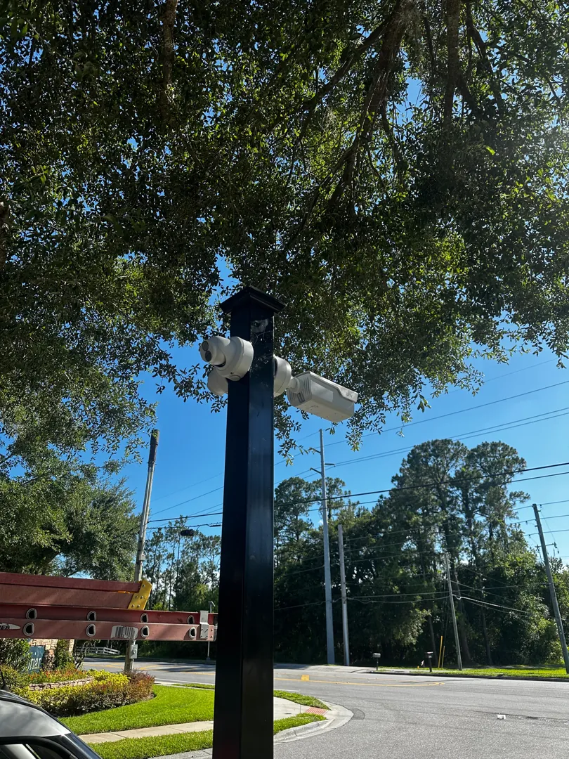 Entrance camera pole at a Data Pro Communications project in Orlando, FL