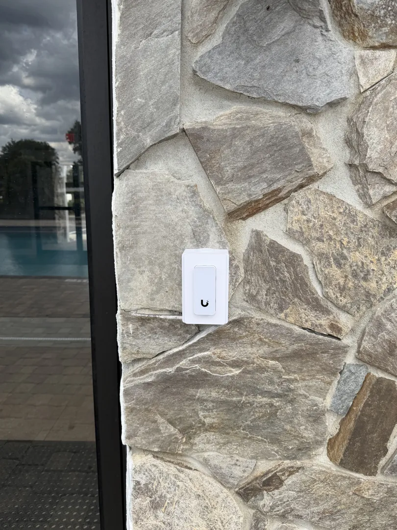 Access reader on stone wall at a Data Pro Communications project in Davenport, FL