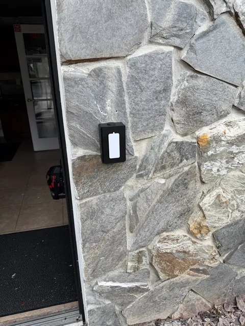 Access reader on a stone wall, Davenport, FL