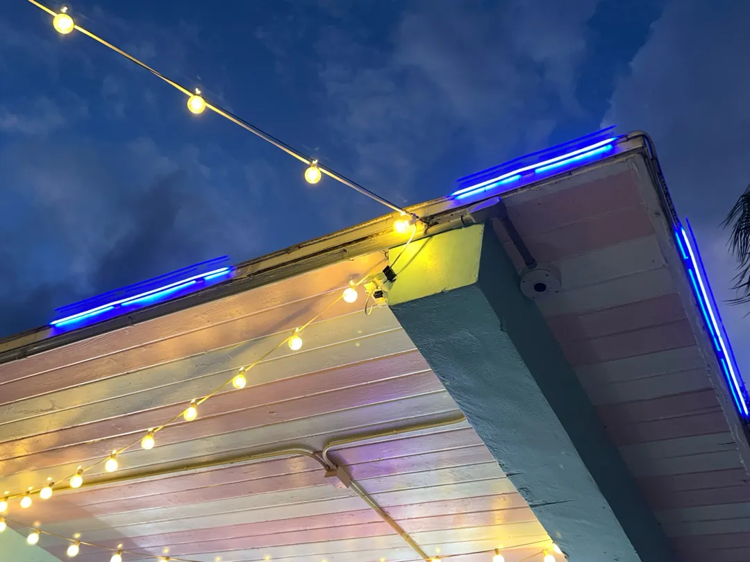 Camera under a walk-up store canopy at a Data Pro Communications project in Tampa, FL