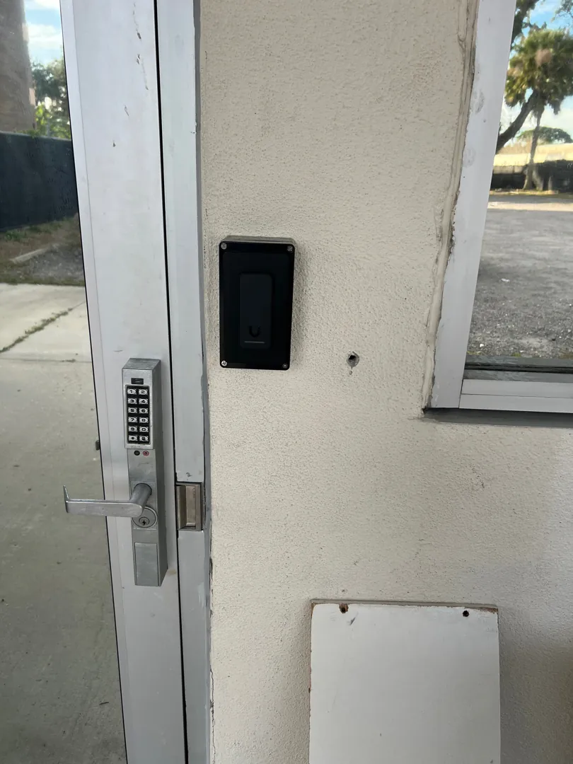 Door w/ reader & strike at a Data Pro Communications project in Orlando, FL