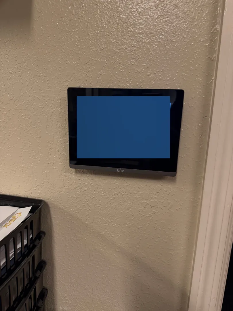 Video intercom indoor display on wall at a Data Pro Communications project in Kissimmee, FL