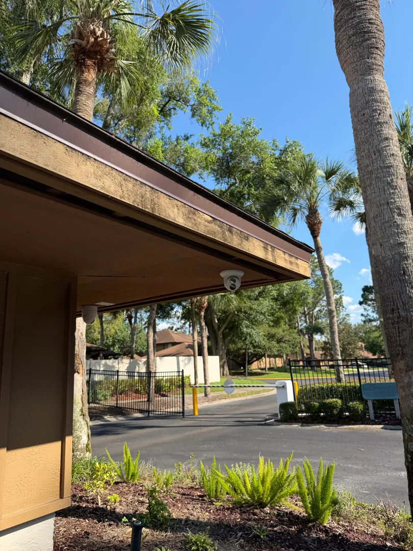 Gatehouse camera over the entry drive at a Data Pro Communications project in Lake Mary, FL