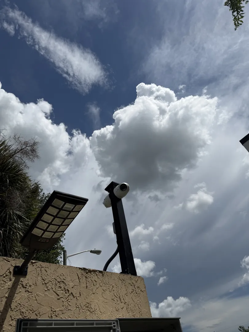 Compactor enforcement camera pole at a Data Pro Communications project in Winter Park, FL